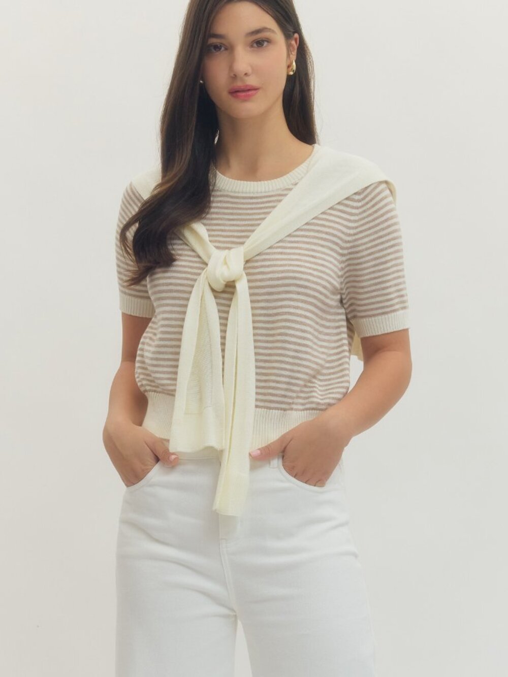 Striped short sleeve knit top featuring attached knit scarf detail at neckline